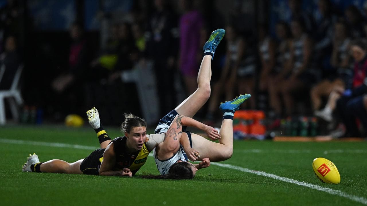 Beth Lynch tackles Julia Crockett-Grills.