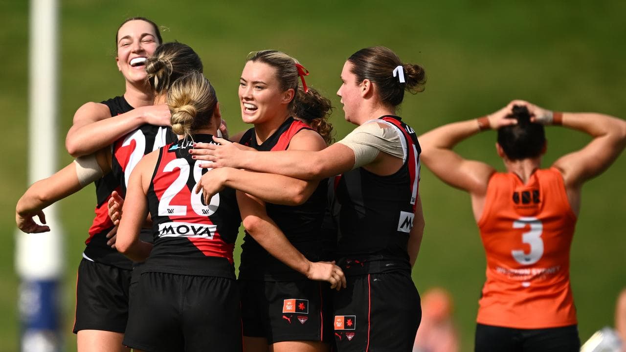 Celebrating Essendon players.