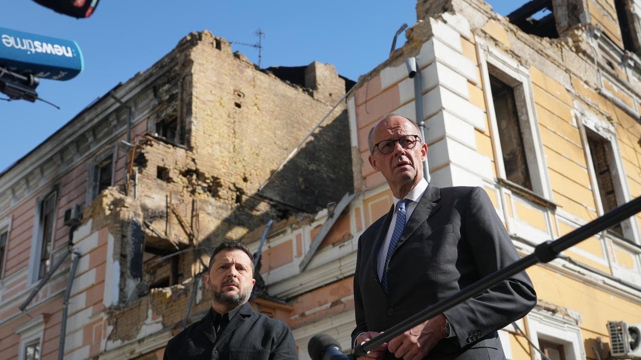 Volodymyr Zelenskiy and  Friedrich Merz