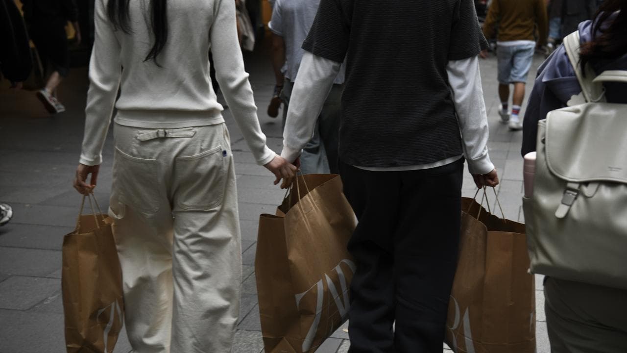 People are seen in the CBD, in Sydney,