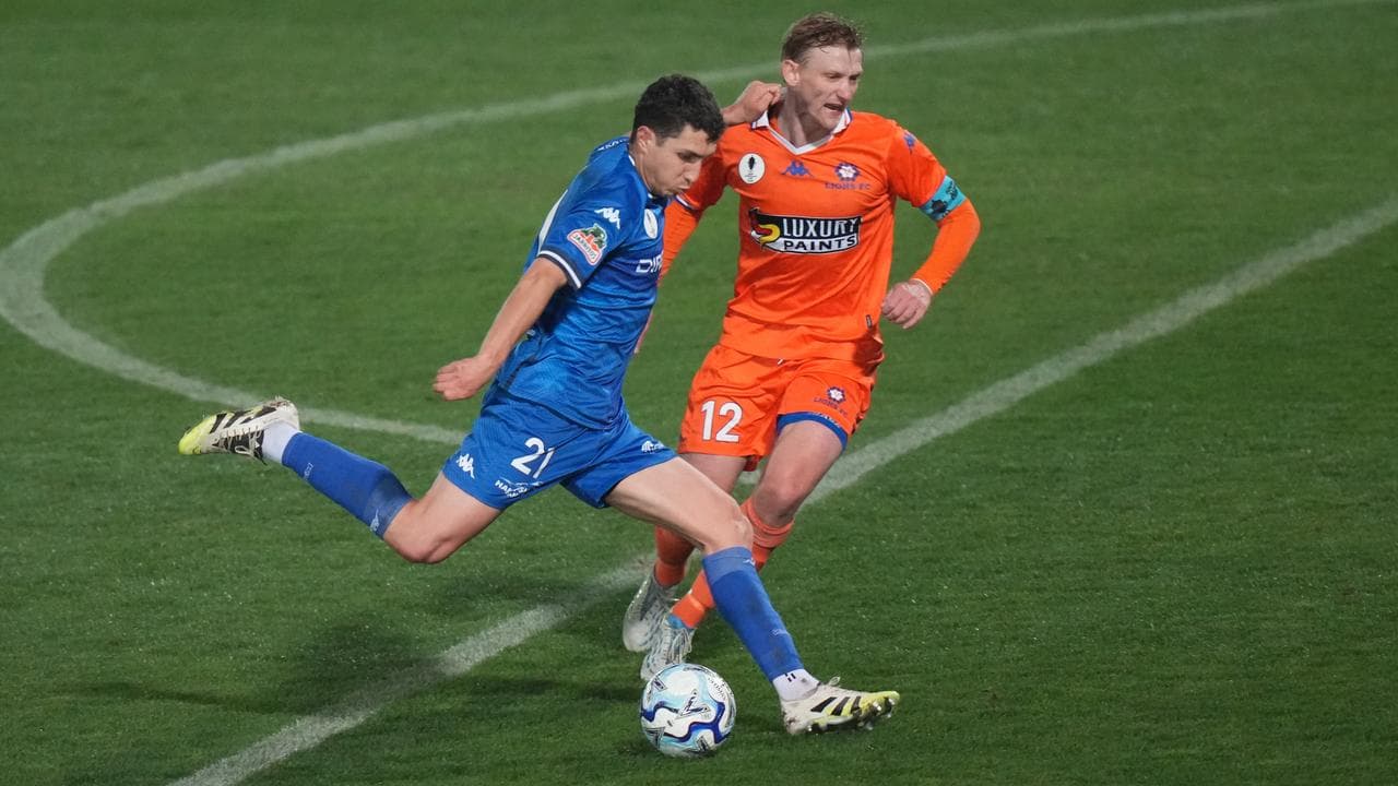 Sebastian Pasquali competes with Lions FC's Shaun Carlos