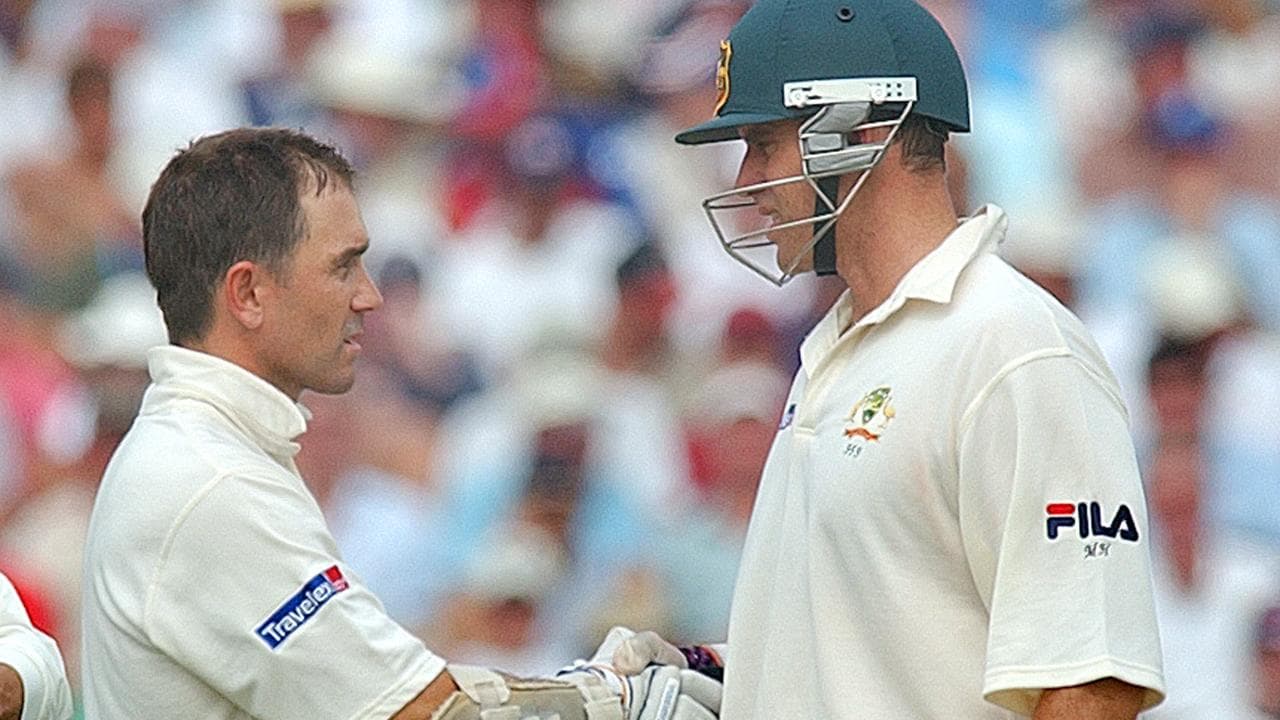 Justin Langer and Matthew Hayden (r).