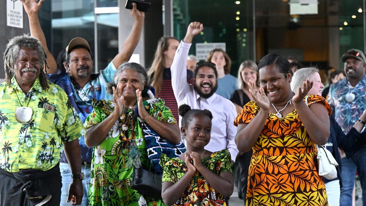 People celebrate outside court (file image)