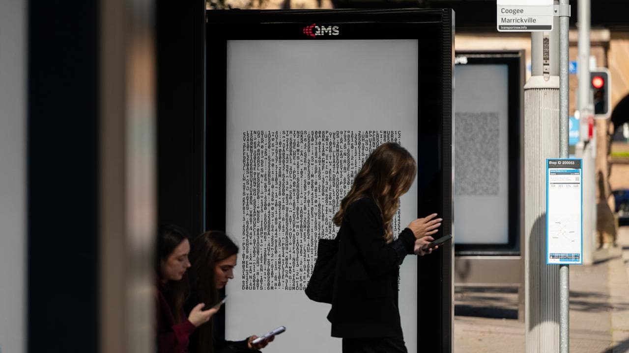 An advertisement at a bus stop
