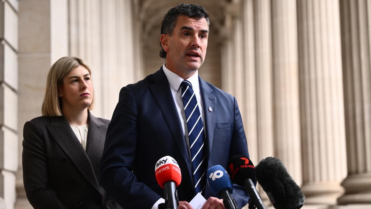 Jess Wilson and police spokesman Brad Battin