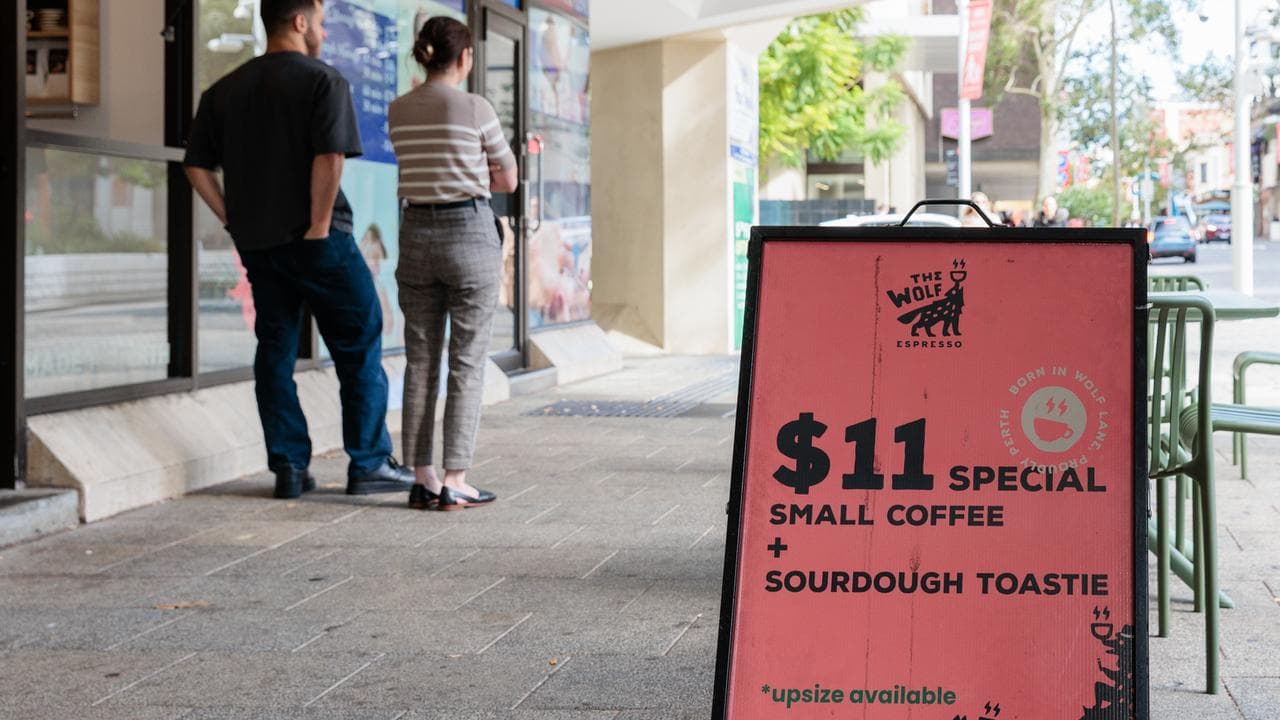 A sign advertising coffee