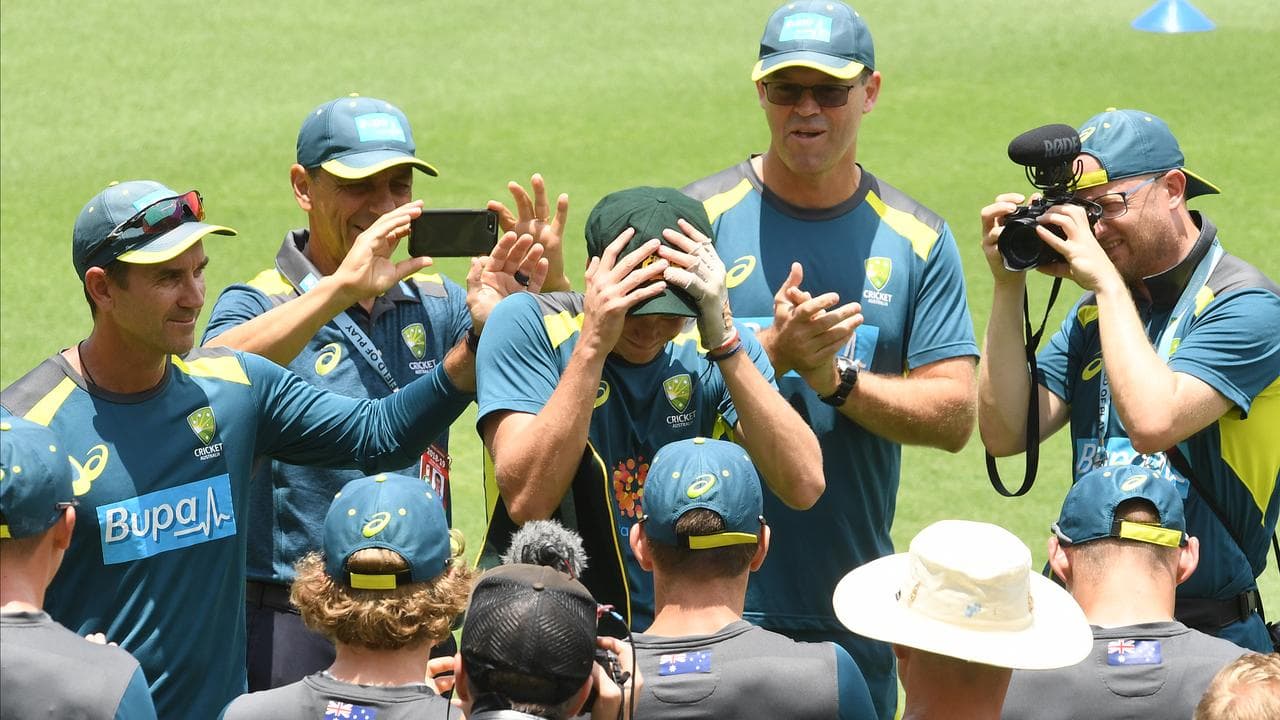 Australian coach Justin Langer (left)