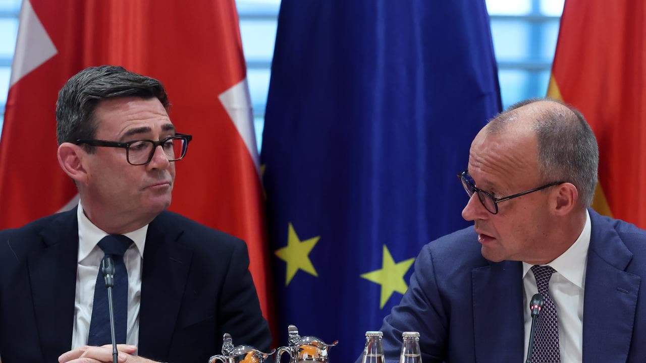 Burnham with German Chancellor Friedrich Merz.