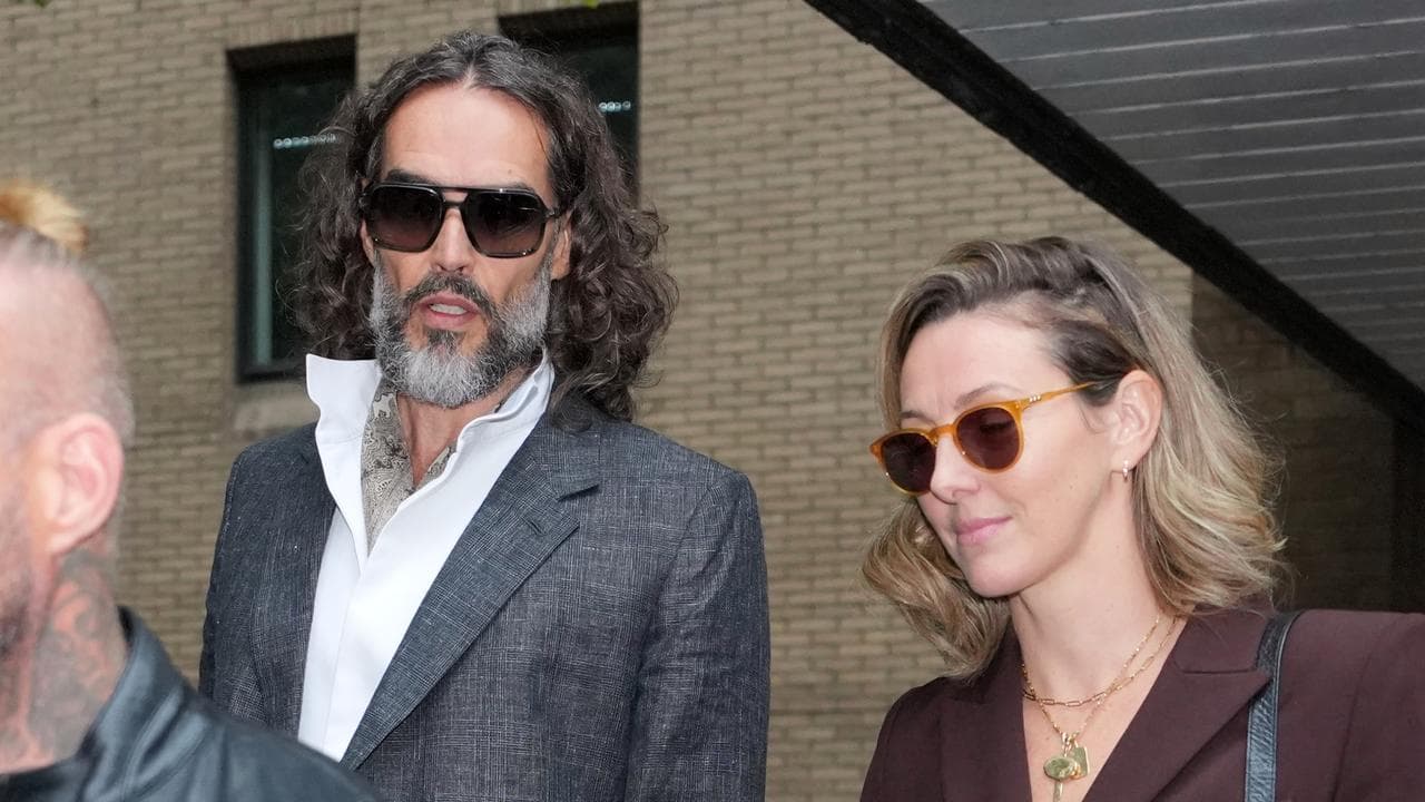 Russell Brand with wife Laura Brand outside court earlier this week.