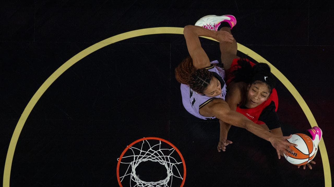 Golden State's Kiah Stokes blocks a shot by Angel Reese