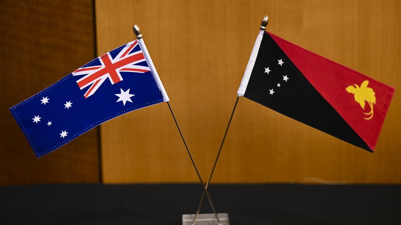 An Australian and PNG flag (file image)