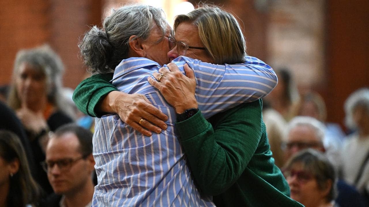 Two women hugging
