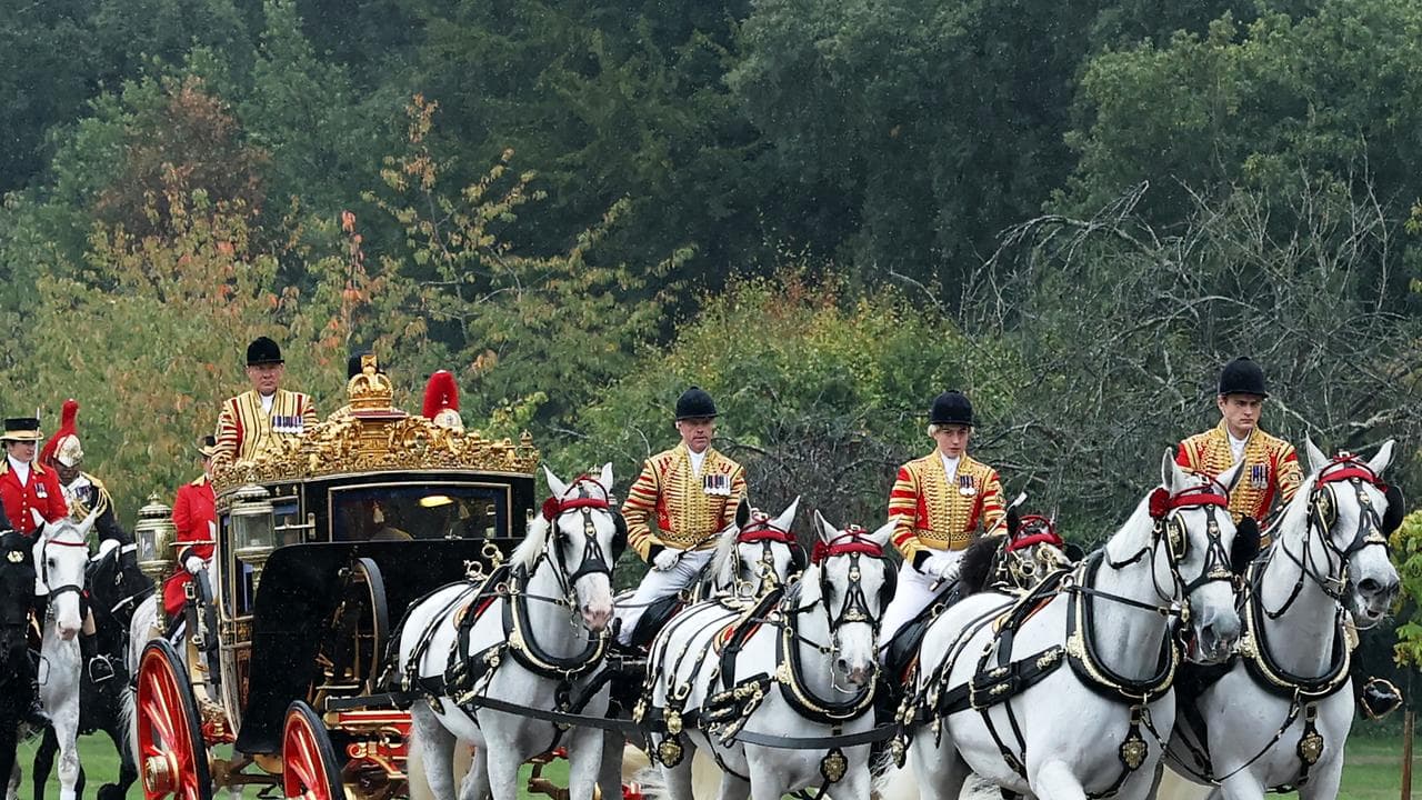 A coach lead the procession to a ceremonial welcome at Windsor Castle