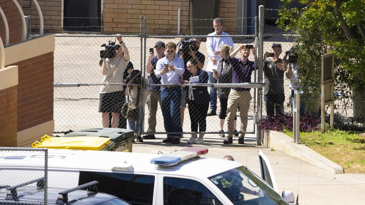 Media wait for Brendan Nugent to depart from the court