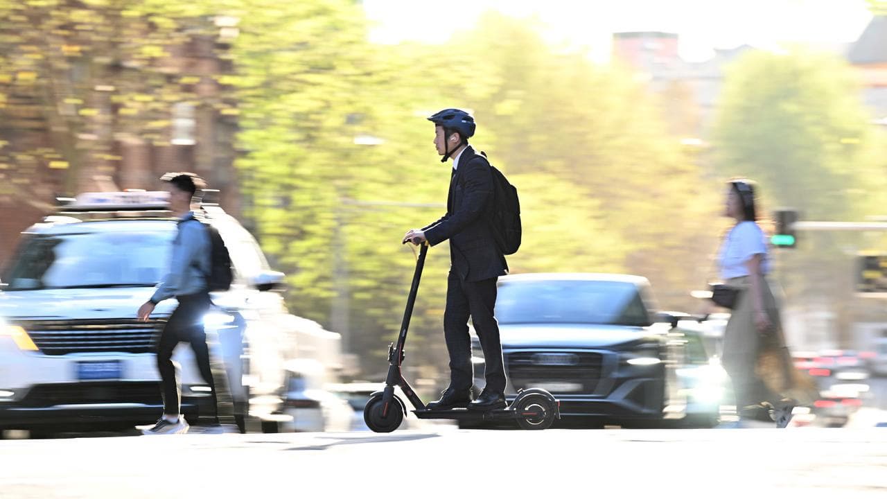 An e-scooter rider in Sydney, NSW