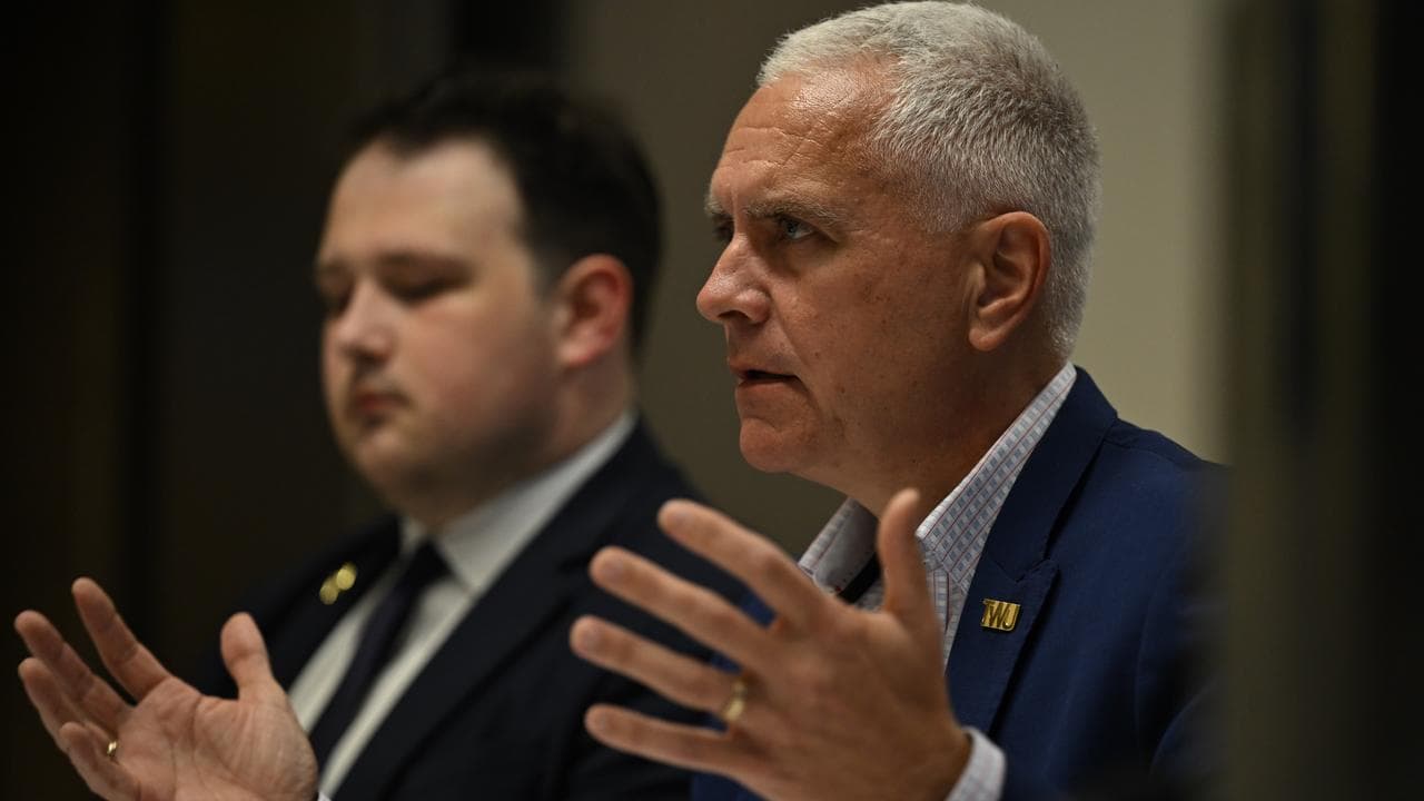 Michael Kaine (right) of the Transport Workers Union