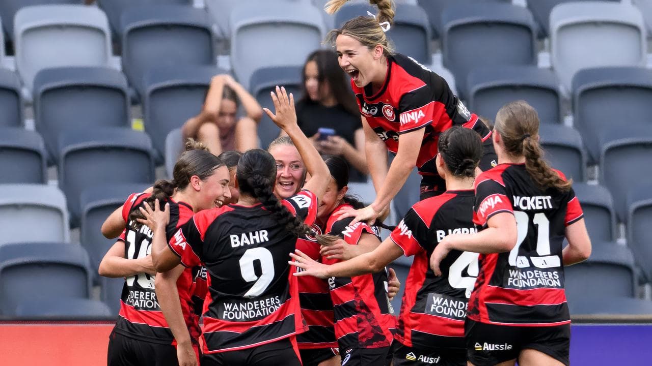 Celebrating Western Sydney Wanderers players.