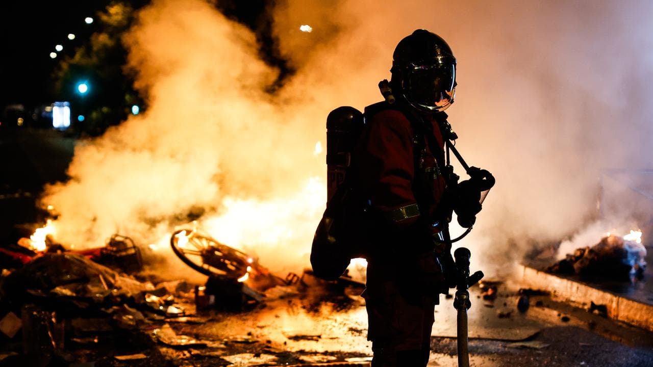 A French firefighter during protests in Paris, France
