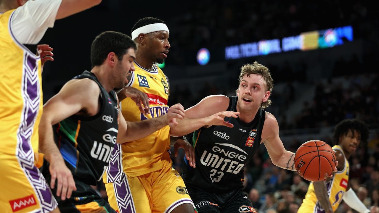 Luke Travers of United drives