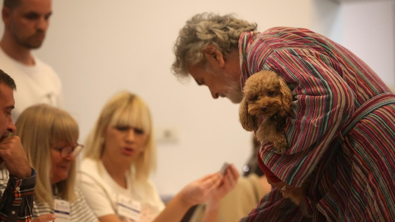 Voter carrying a dog