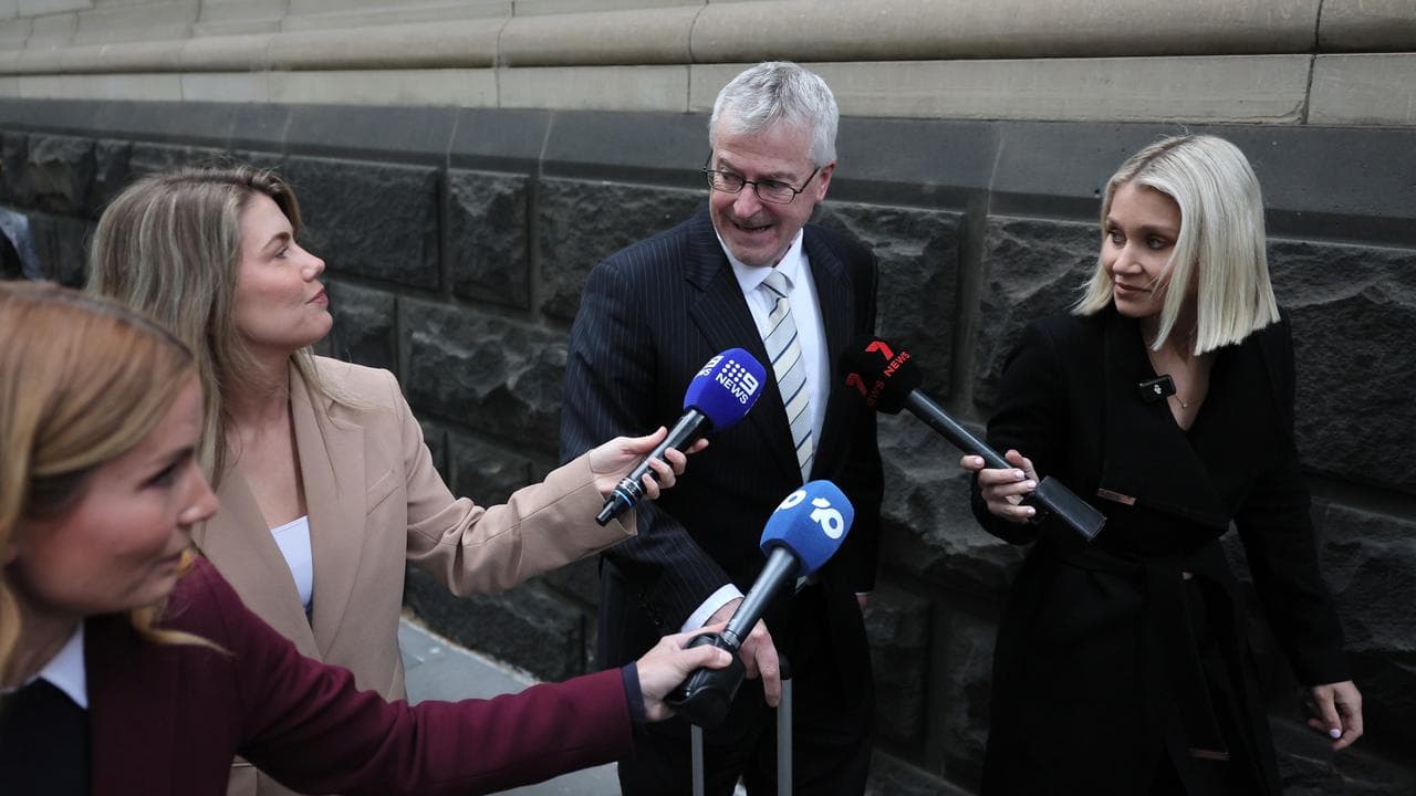 man questioned by reporters outside court