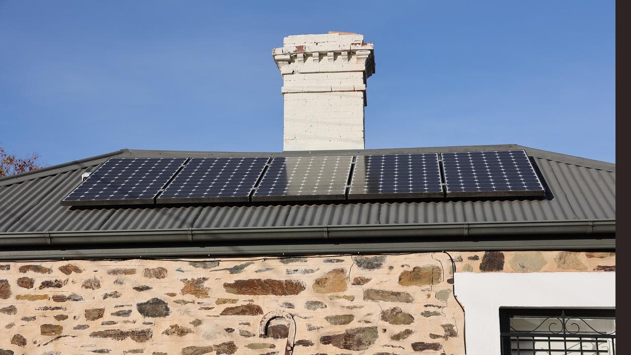 Solar panels are seen on the roof of a property (file image)