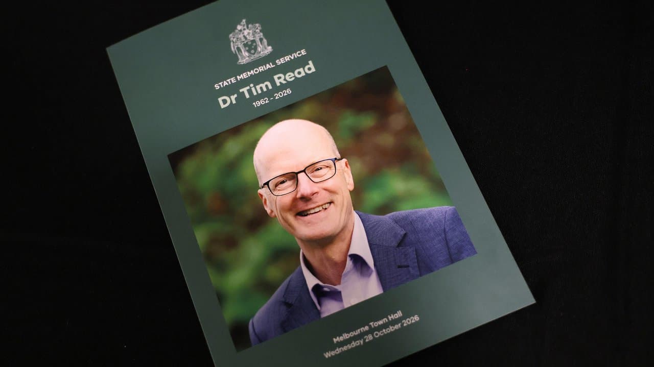 A service booklet during a state memorial service for Tim Read