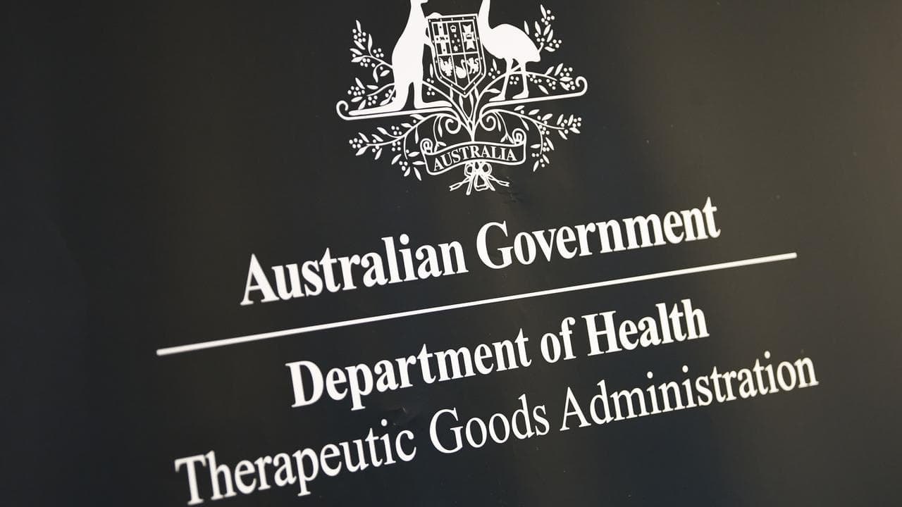 Aust coat of arms with TGA underneath