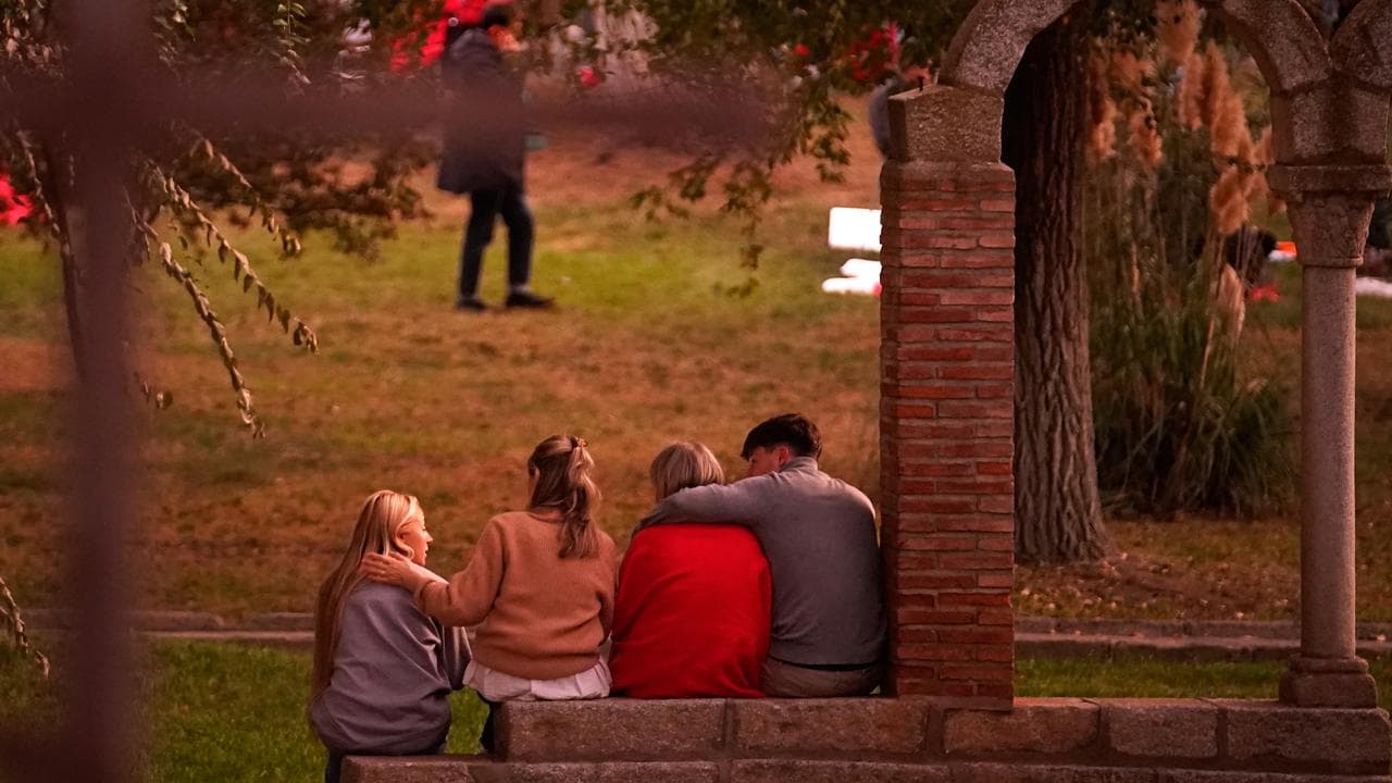 People searching for relatives from a train crash gather in Toledo