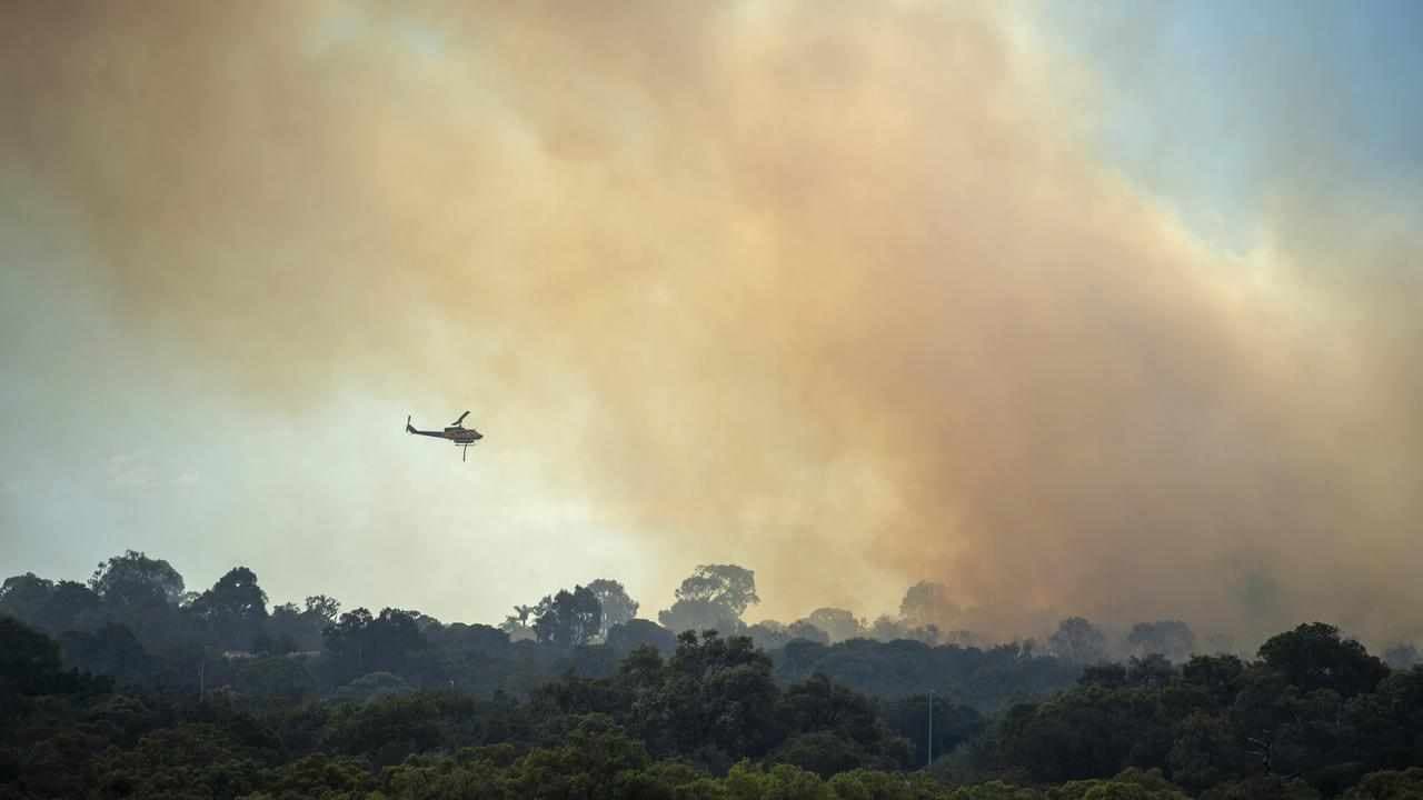 Bushfires threatening farming communities downgraded