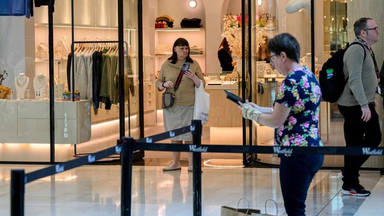 Shoppers return to 'eerie' shopping mall after massacre