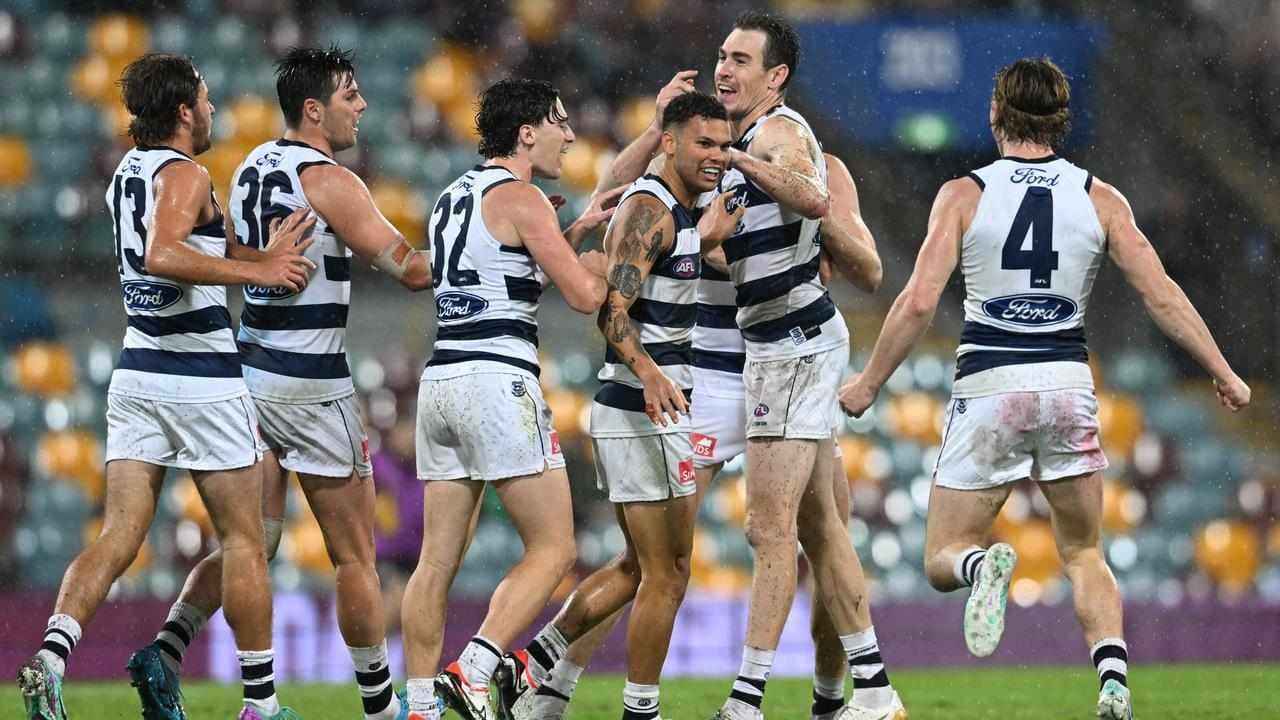 Cats clear on top as Lions cop lesson in the wet