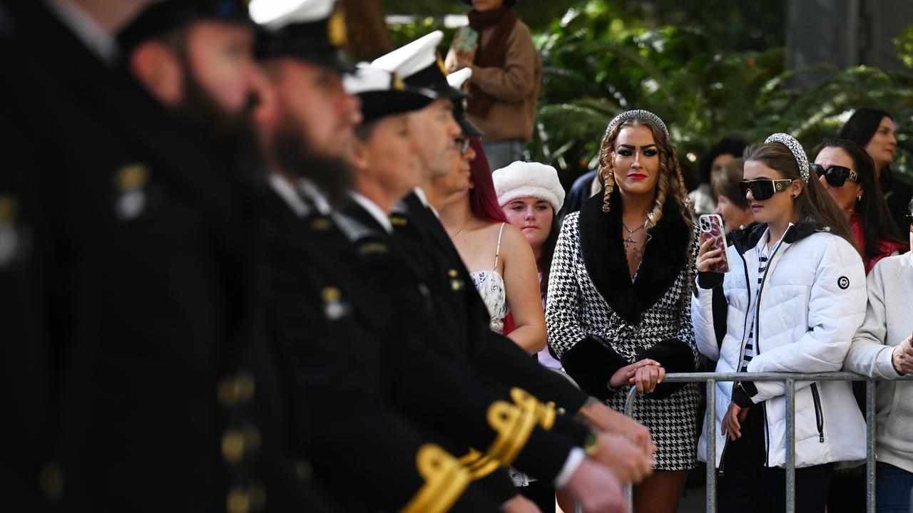 Solemn dawn before thousands march through Sydney