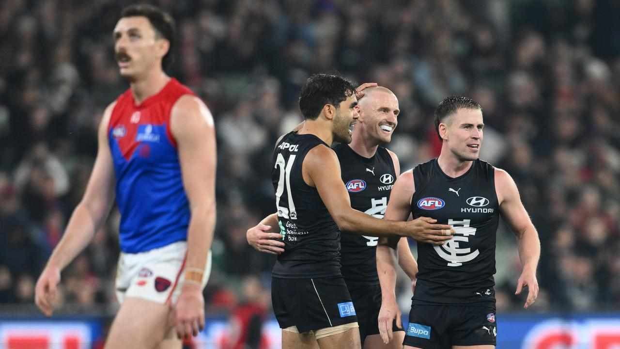 Blues hang on in AFL thriller against Demons
