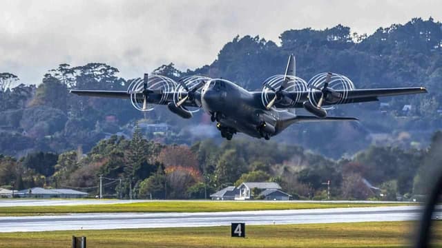 Stranded Aussies rescued from violence-torn island