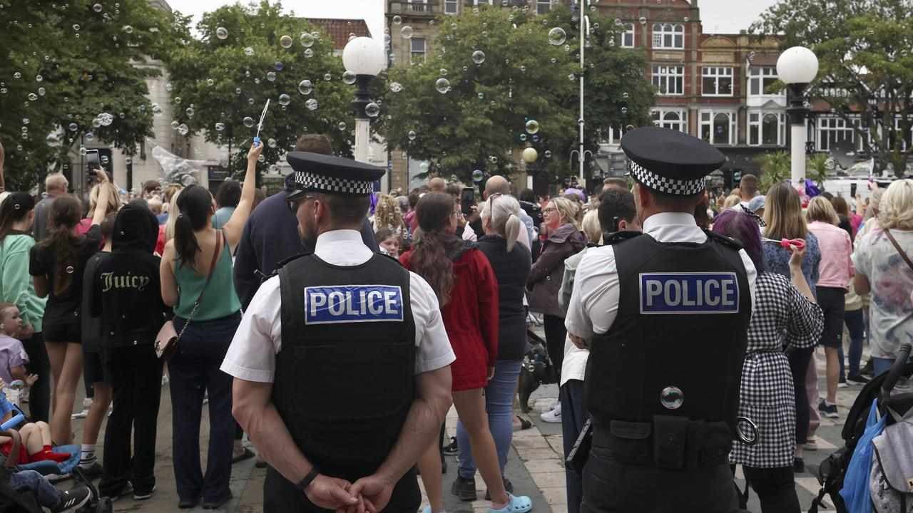 Britain adds more prison places as riots continue