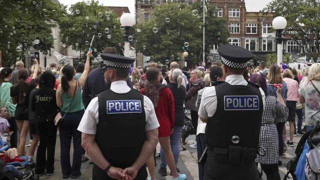 Britain adds more prison places as riots continue