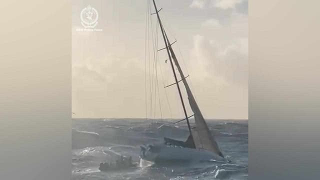 Extremely lucky yacht duo 'glad to be back' on dry land