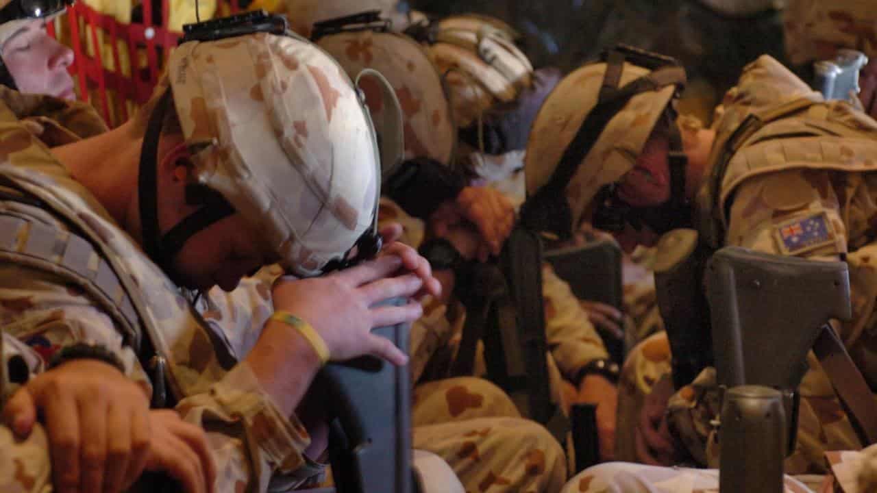 Howard confronts Iraq War call as documents unearthed