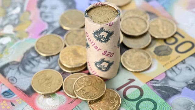 Australian dollar firms but remains vulnerable