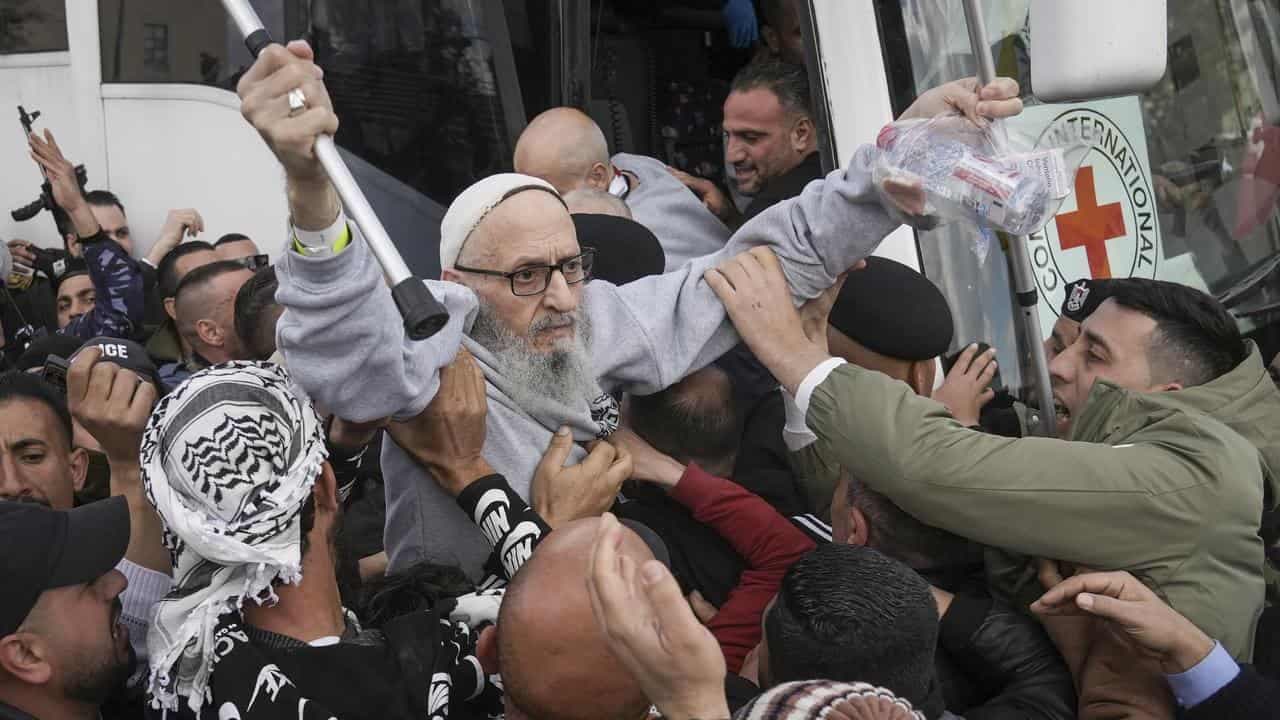 Three Israeli hostages released in latest Gaza exchange