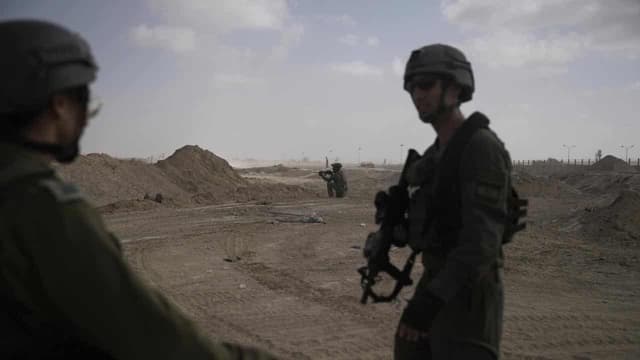 Four hurt in Israeli strike on a car in the Gaza Strip