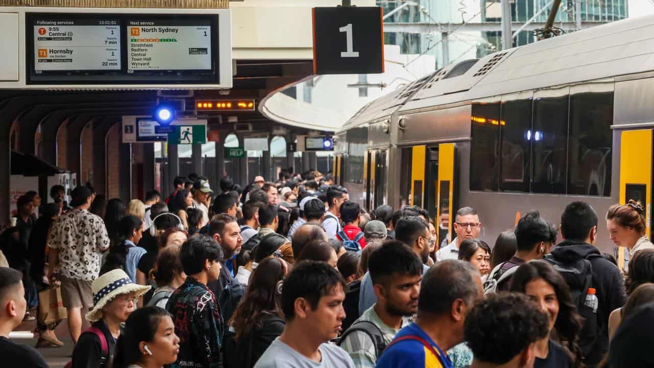 Train network recovers as workers continue court fight