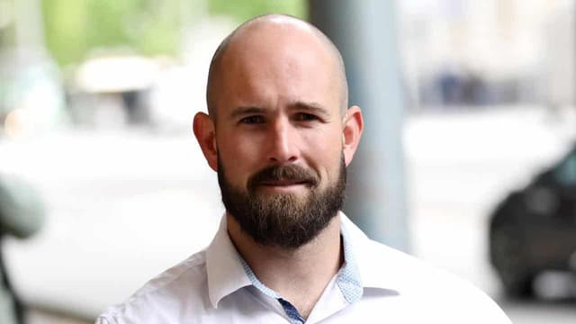 Neo-Nazi fights charge of intimidating police officer