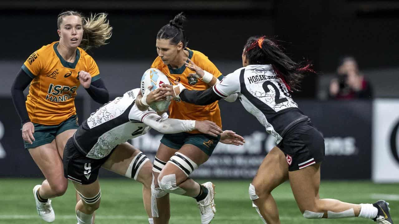 Australia's women bounce back to book sevens semi berth