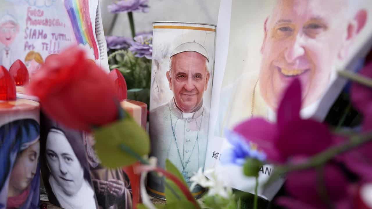 Pope reaches two-week mark at hospital with pneumonia