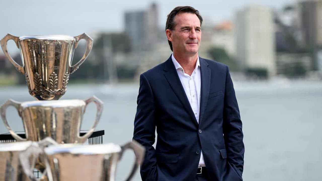 AFL looks to kick off season as cyclone watch continues