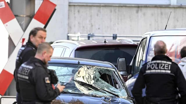 Two dead, suspect held after car hits crowd in Germany
