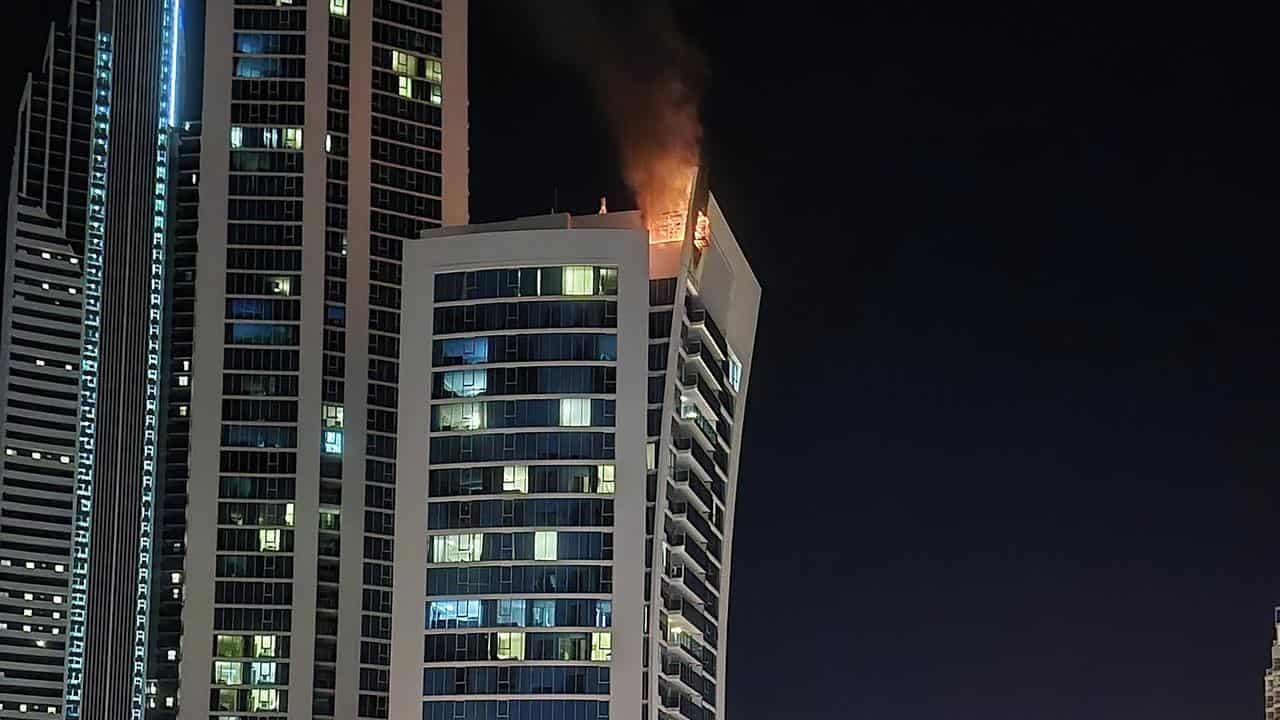 Hundreds evacuated as tourist hotel roof catches fire
