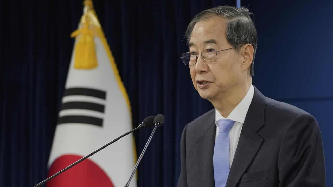 South Korean court reinstates impeached PM as president